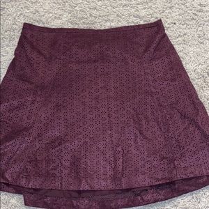 Suede oxblood skater skirt with laser cut detail